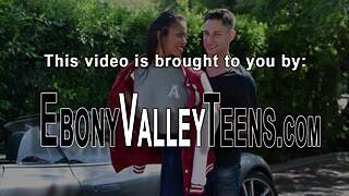 Ebony teen enjoys gentle ride.