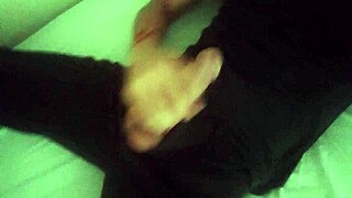 horny guy in black pants groans while stroking big cock after work