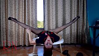 Nice lady performs striptease in pantyhose and heels at the round table