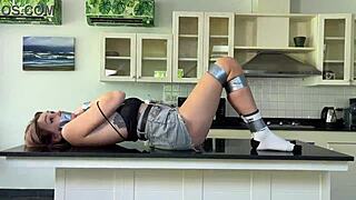 Blonde teen bound and teased on countertop with moaning