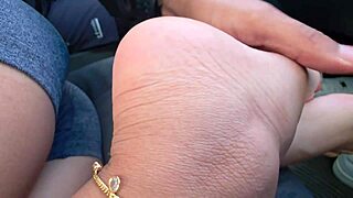 I sneakily touch her feet and butt in public while she rests in my car