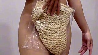 unboxing a beautiful asian product in the bedroom