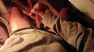 Hey, watch this hot guy in sweater jerk off his massive cock with loud moans