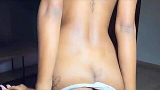 latina babe shows off tight curves at home