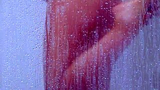 College tanned gorgeous girl showers in bikini