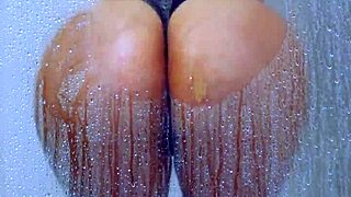 College tanned gorgeous girl showers in bikini