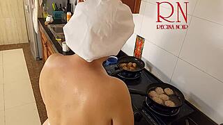 Nudist Housewife Regina Noir Cooks in the Kitchen with Naked Maid Assistance in Chapter One.