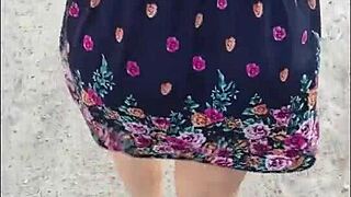 street whore shows her upskirt in the city