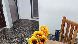 A fake student in a sexy short skirt masturbates at home with a dildo her tits look inflated