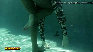 Girls kiss nicely in the pool!