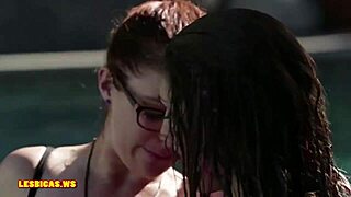 Girls kiss nicely in the pool!