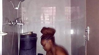 naughty african student nurse bares plump perky tits bucket bathing bts