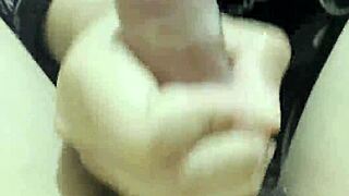 POV homemade Thai girlfriend strokes huge cock in bed