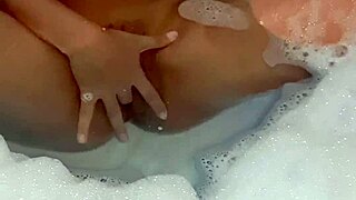 Latina teen babe fingers her perfect body to intense orgasm in bathtub