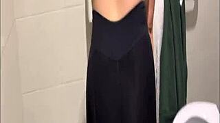 curvy latina strips naked in public bathroom flashing her huge ass for everyone to see