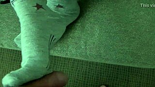 Shana's sexy 18+ feet stroke cock in steamy footjob close-up.