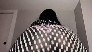 sensual teasing shaking ass in tight outfit
