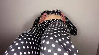 sensual teasing shaking ass in tight outfit