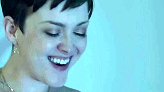 jade and madelynn are cute young lesbians scissoring each other in bed