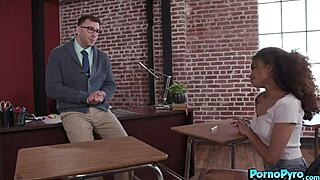 Cute ebony student sucks teacher cock in classroom