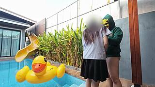 Thai teen in school uniform fucks by the pool