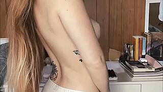 Petite teen strips then stuffs panties in pussy for orgasm